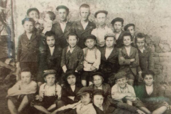 Arnold  (back row, far right) with his cheder class. Out of twenty-two students, four survived the Holocaust. Date and place unknown. Credit: Crestwood Oral History Project.