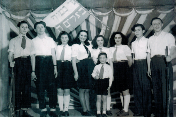 Henry (second from the left) at a performance to celebrate Hanukah. Visingsö, Sweden, 1946.