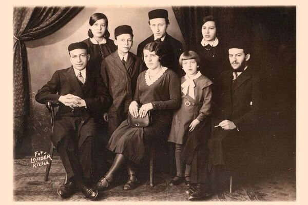 Paula (Pola) and her seven siblings. Sitting, from left to right: Alter, Miriam, Paula (Pola), and Yechezkel. Standing, from left to right: Rivcha, Leibel, Avram and Toiba. Poland, circa 1935.