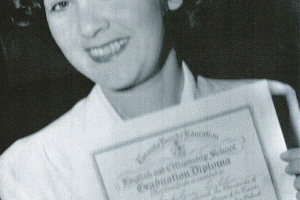 Sophie with her English and Citizenship School graduation diploma. Toronto, 1949.