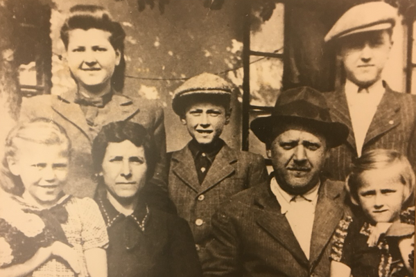 Israel (centre) with family before the war. In front (left to right): Israel’s sister Leah; his mother, Raizel; Israel; his father, Yaakov Tzvi; and his sister Tziporah. Standing in back: Israel’s siblings Golda (Aranka) and Moritz. Slovakia, late 1930s.