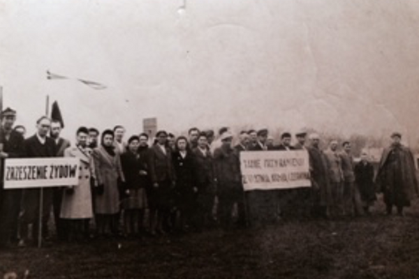 The Jewish community of Sochaczew, Poland, during a May Day celebration. Andrew is second from the right. 1945.