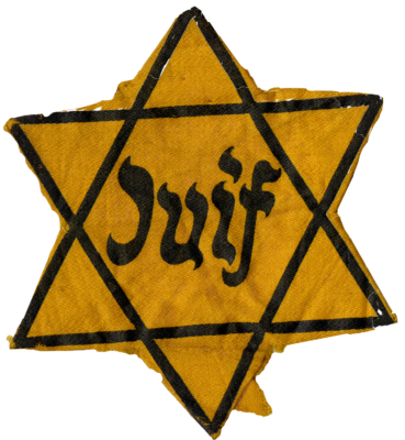 Étoile à six branches, formée de deux triangles inversés et superposés sur un morceau d’étoffe jaune. Au centre, le mot « Juif ».