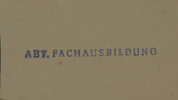 Paper with stamp of German words.