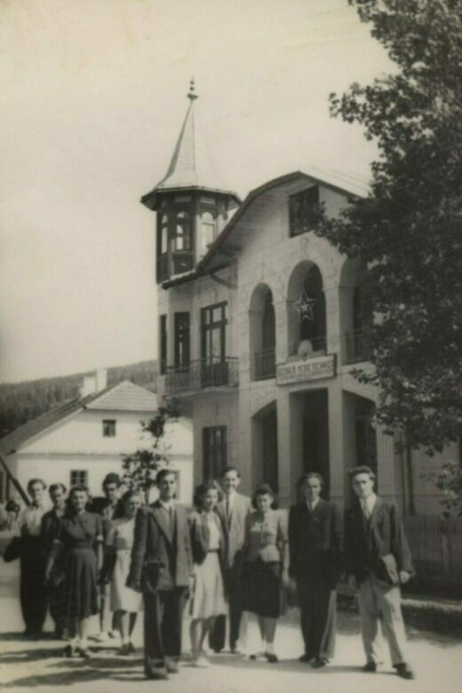 Felicia (third from right), with friends in front of the building she arranged to have used as a high school. Dorna, 1946.