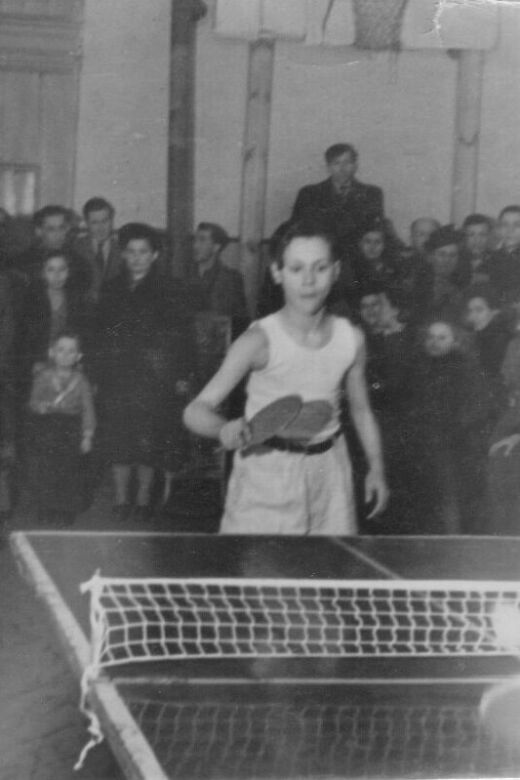 Phil playing ping pong after the war.