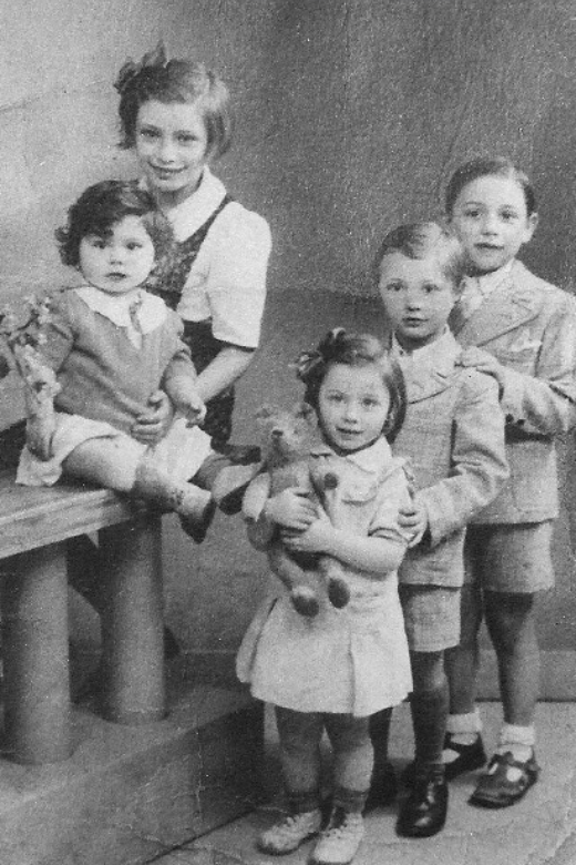 The Fikman children in Paris, circa 1940. On the left: Isabelle and Mireille (in front). On the right (back to front): Fernand, Maurice and Denise.