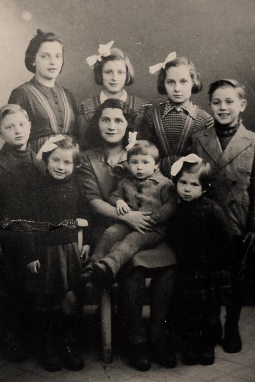 Perla with her six children and two nieces. Back row, left to right: Cécile Lis, Isabelle, Isabelle Lis, Maurice. Front row, left to right: Fernand, Denise, Perla, Monique, Mireille, circa 1943.